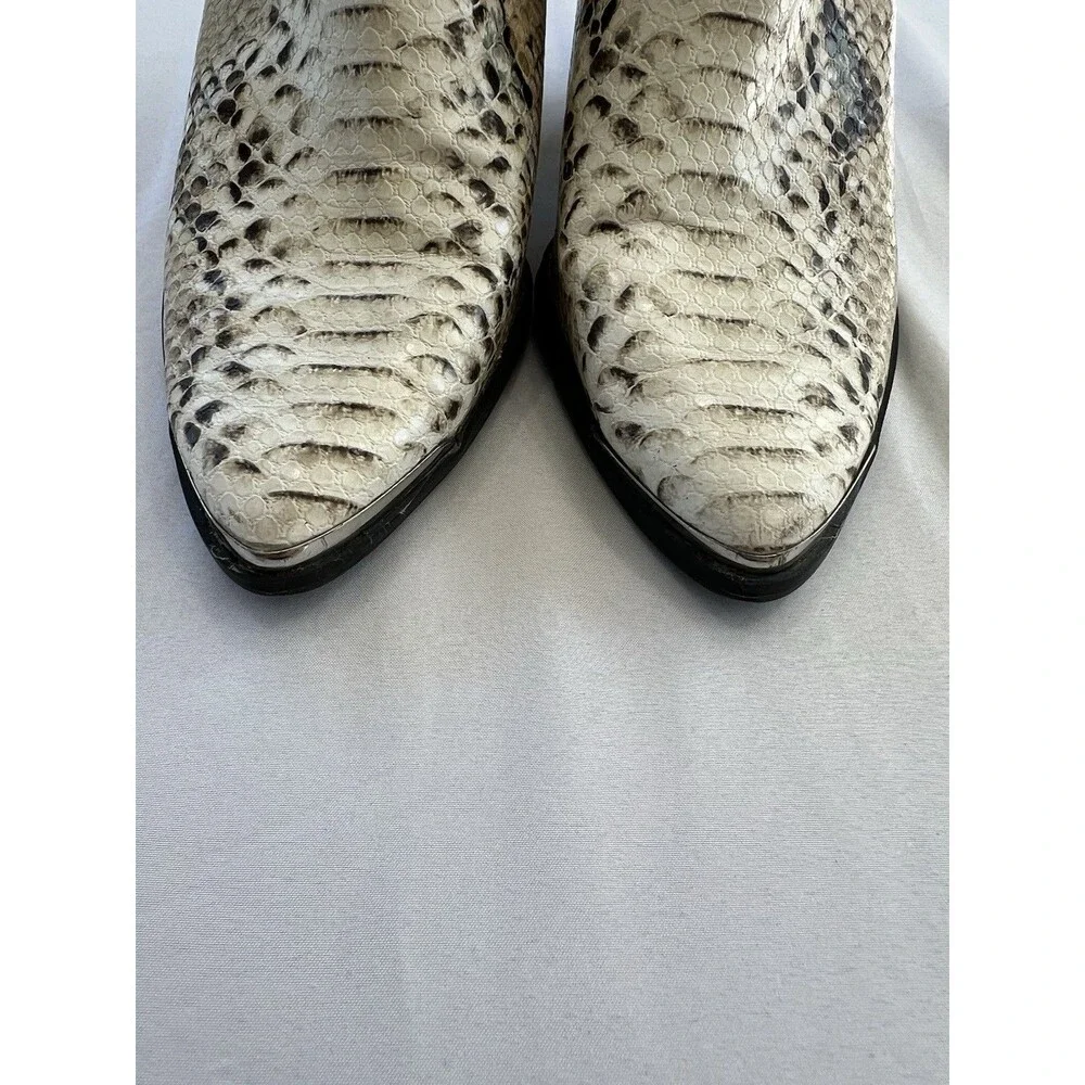 Report trixi snakeskin